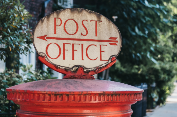 Post office sign with arrow