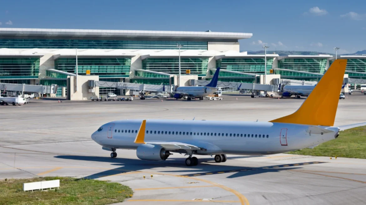Airport runway with airplanes