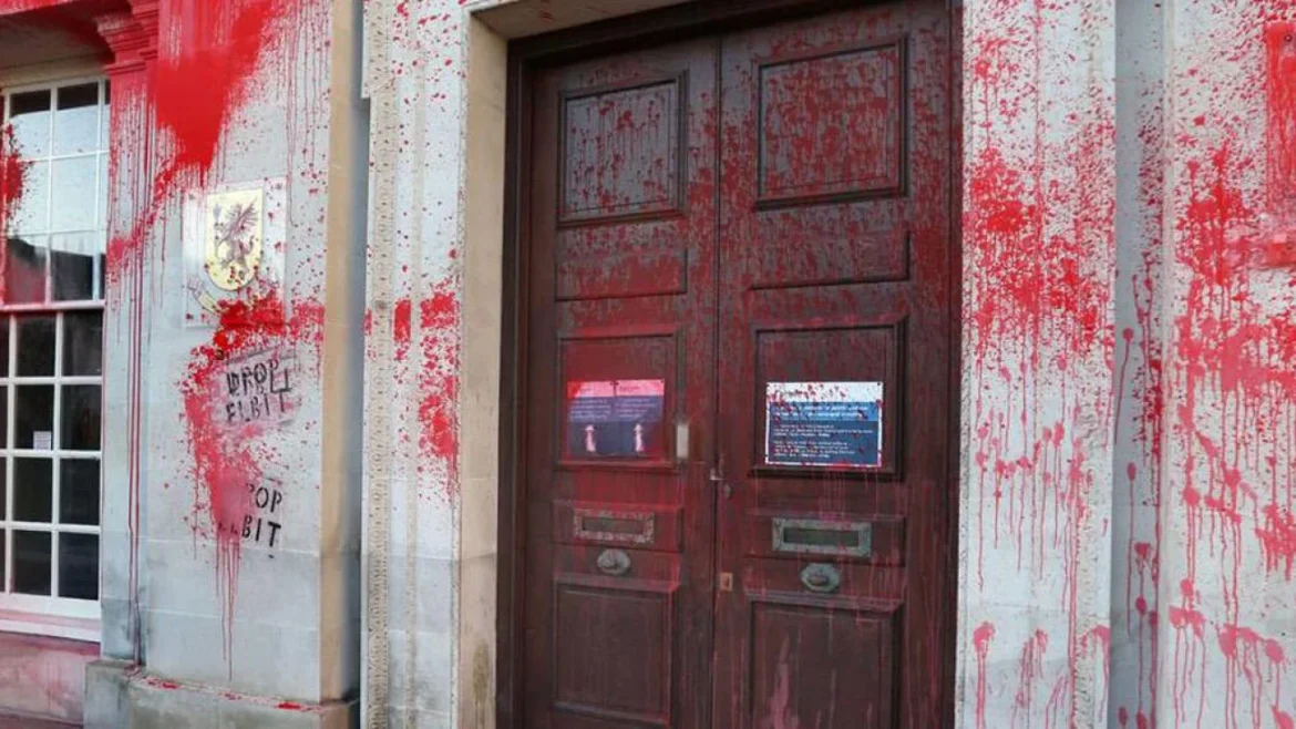 Vandalized building with paint