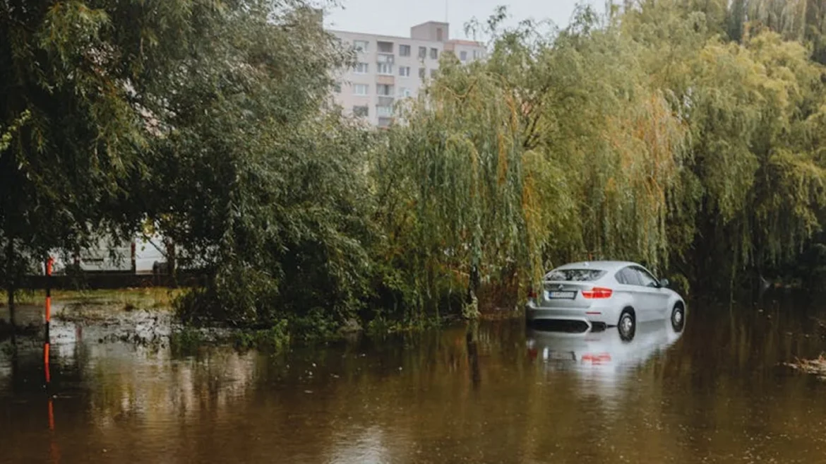Car stranded in floodwaters after Storm Bert flooding