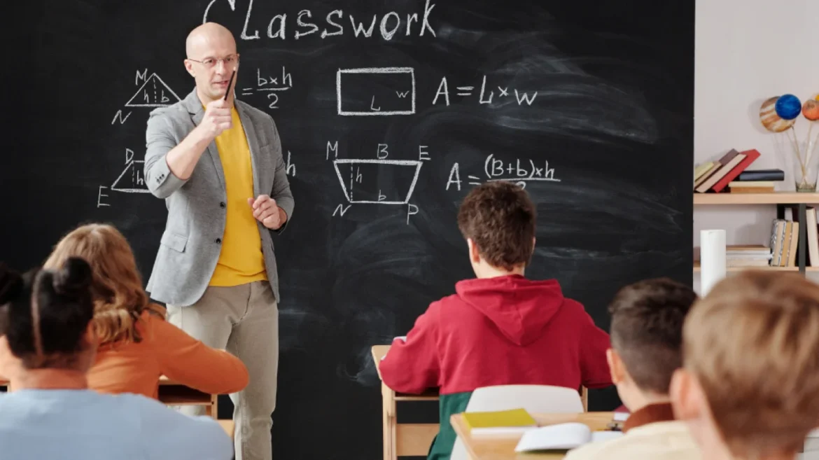 Teacher instructing students